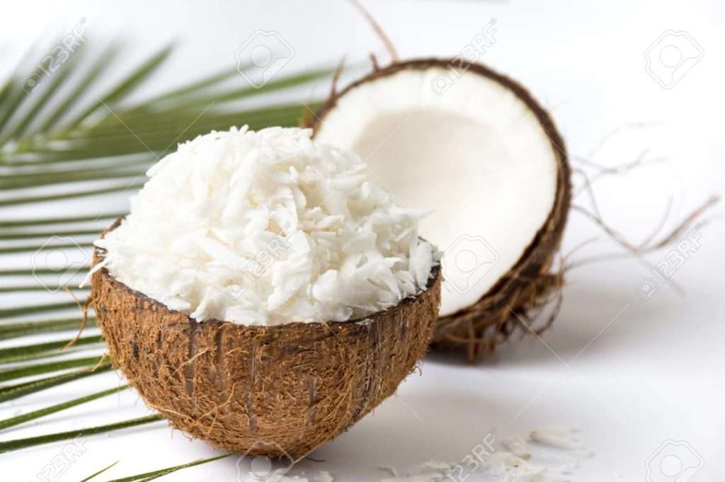 grated coconut fruit in a natural shell
